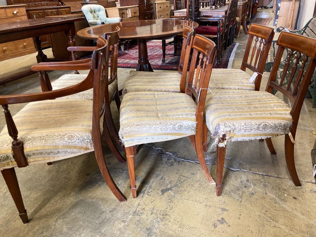 A set of six Sheraton style mahogany dining chairs